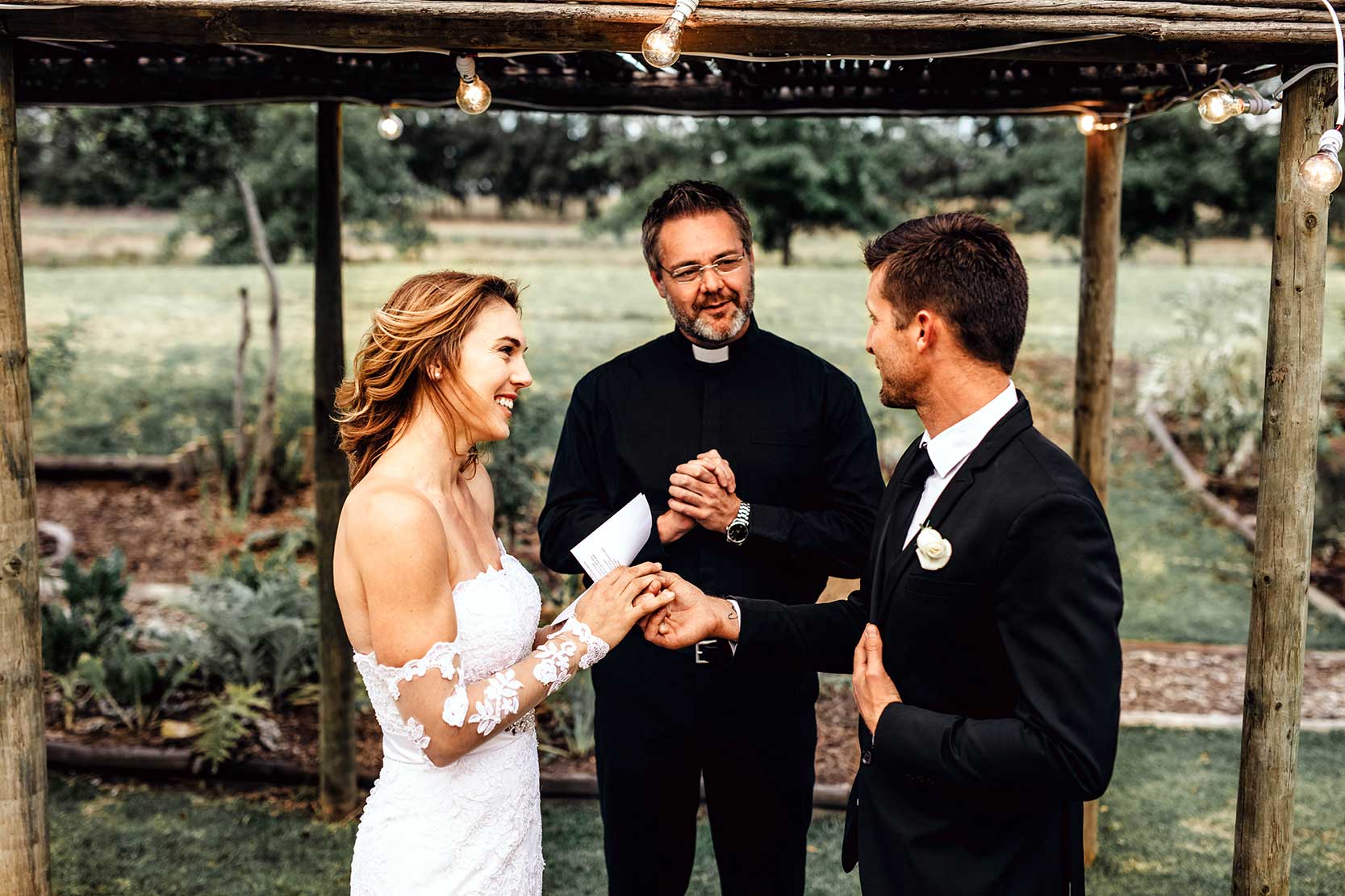 Young Couple reading wedding vows after preset has been applied